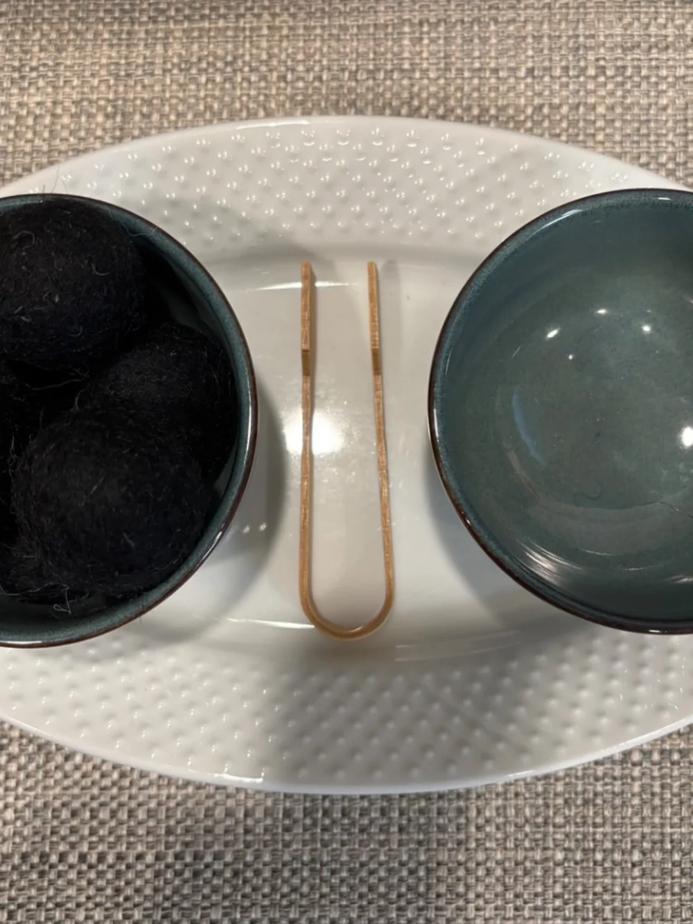 practical life felt pom tonging with bamboo tongs by idlewild montessori